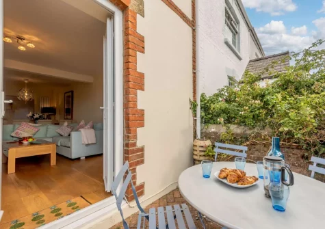 The alfresco dining area & enclosed garden at 1 Clareston Road, Tenby