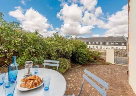 The alfresco dining area & enclosed garden at 1 Clareston Road, Tenby