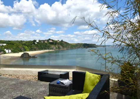 The sea-view terrace & outdoor sitting area at 1 Royal Victoria Court, Tenby