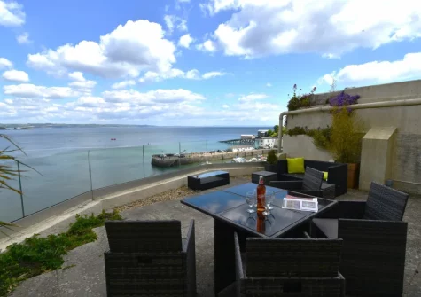 The sea-view terrace & alfresco dining area at 1 Royal Victoria Court, Tenby