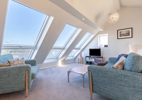 The mezzanine living area at 11 Captains Walk, Saundersfoot