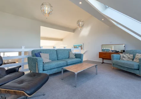 The mezzanine living area at 11 Captains Walk, Saundersfoot