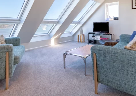 11 Captains Walk, Saundersfoot is a stylish split-level house commanding spectacular views across Saundersfoot Bay, featuring two distinct lounge areas, contemporary interiors throughout, and an easy stroll to the golden beach and harbour below.