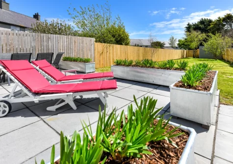 The patio, outdoor sitting area & garden at 16 Maes Gwydryn, Abersoch