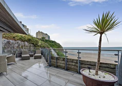 The balcony terrace & outdoor sitting area at 19 Waters Edge, Tenby