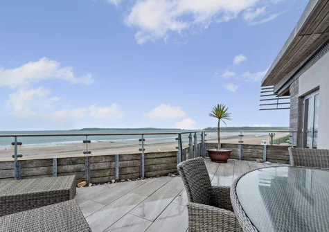 The balcony terrace, outdoor sitting & alfresco dining area at 19 Waters Edge, Tenby