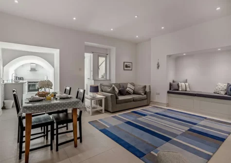 The living & dining area of the self-contained basement apartment at 2 Lexden Terrace, Tenby
