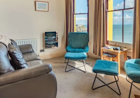 2 St Agathas, Tenby is a characterful Georgian first-floor apartment on the town's famous Esplanade, offering stunning South Beach views, elegant period features, and direct access to four award-winning sandy beaches and the Pembrokeshire Coast Path.