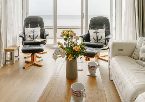 2 Strandways, Saundersfoot, is a charming three-bedroom ground-floor apartment just steps from the beach and harbour. Enjoy panoramic bay views from your private terrace and explore the best of Pembrokeshire's coast, countryside, and attractions.