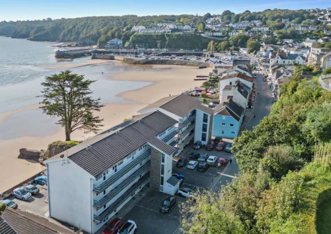 22 Beach Court is a second-floor apartment with balcony offering beautiful sea views