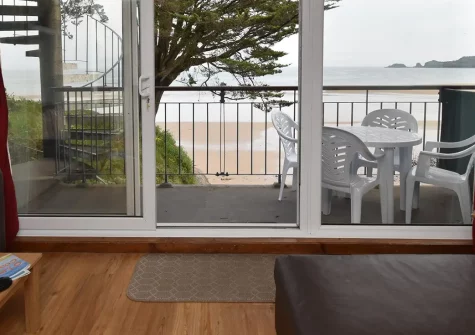 22 Beach Court, Saundersfoot is a stylish second-floor apartment with spectacular bay views and direct beach access. Enjoy open-plan living, private balcony and comfortable sleeping for four, perfect for families and couples seeking a seaside escape.