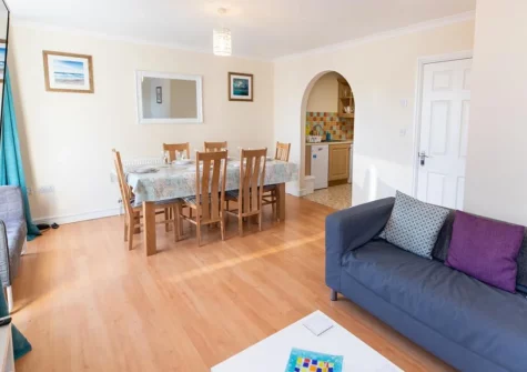 The living & dining area at 2b Arcadia House, Tenby