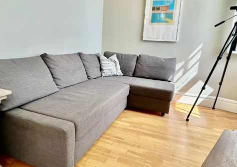 3 Paragon House, Tenby is a beautifully presented one-bedroom apartment with spectacular sea views from the lounge and bedroom, contemporary coastal interiors, and direct access to the Beach via steps just 35 metres from your door.