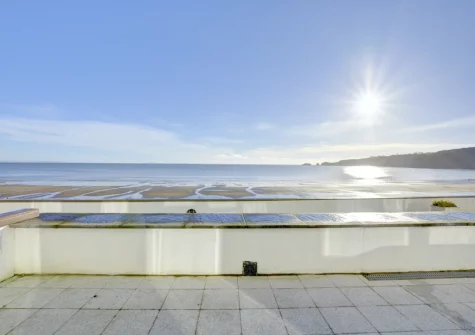 The private sun terrace, with direct access to the beach, at 3 Strandways Court, Saundersfoot