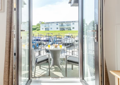 Bedroom #2 balcony & outdoor sitting area at 3 The Boatyard, Abersoch