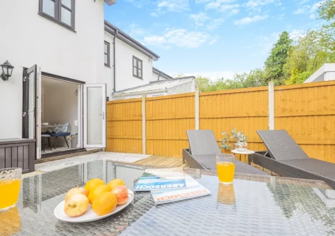 The enclosed decked patio & alfresco dining area at 3 The Boatyard, Abersoch
