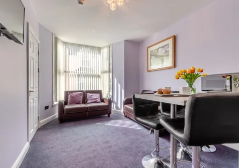 The living & dining area at 3 White Rose, Tenby