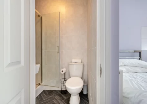 Bedroom #2 & en-suite shower room at 3 White Rose, Tenby