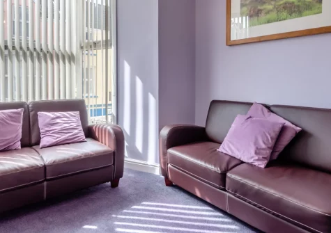 3 White Rose, Tenby is a contemporary first-floor apartment just 200 metres from the historic town walls, featuring two en-suite bedrooms, open-plan living spaces, and easy access to four golden beaches and Tenby's celebrated restaurants.