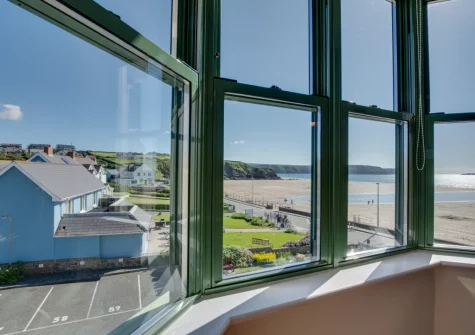 The beach & coastal view from the dining area at 32 St Brides Bay View, Broad Haven