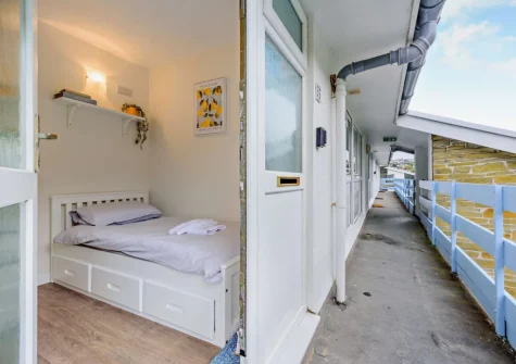 The single bed in the hallway at 35 Beach Court, Saundersfoot