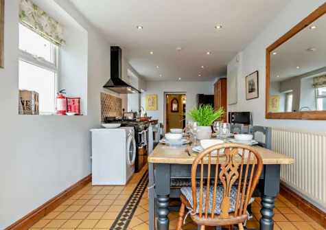 The dining area at 4 Queens Parade, Tenby