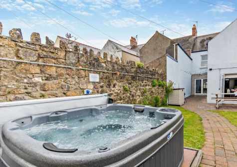 The enclosed garden & hot tub at 4 Queens Parade, Tenby