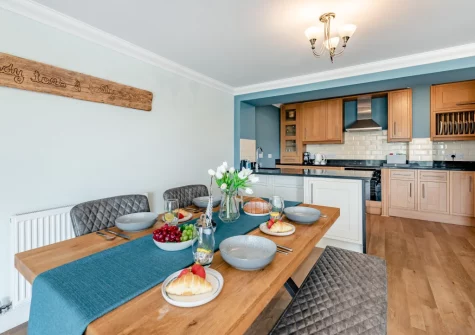 The dining area & kitchen at 5 Bryn Y Mor, Tenby