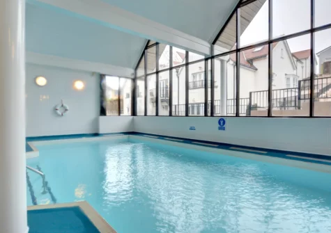 The shared indoor heated swimming pool, sauna and gym at 5 Bryn Y Mor, Tenby
