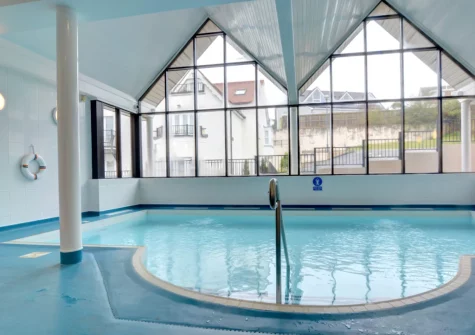 The shared indoor heated swimming pool, sauna and gym at 5 Bryn Y Mor, Tenby