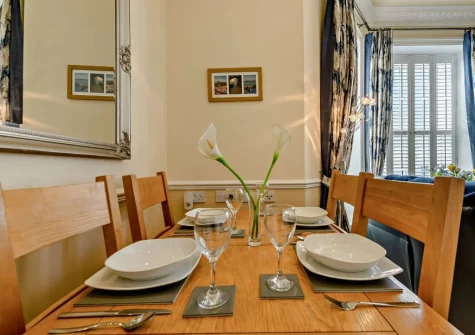 The dining area at 5 South Beach Court, Tenby