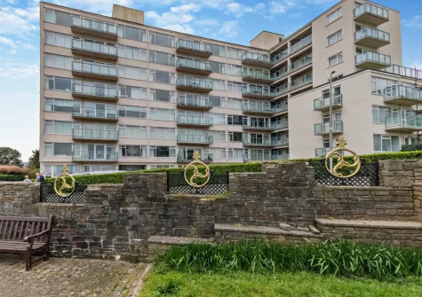 50 Croft Court is a spacious fifth-floor apartment with beautiful sea views from the balcony