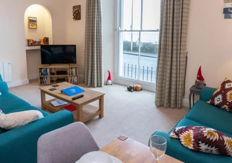 6 Richmond House, Tenby is a charming family-friendly apartment offering direct beach access and contemporary comfort. Wake to seaside views, explore Pembrokeshire's magical attractions, and create unforgettable coastal memories with your loved ones.