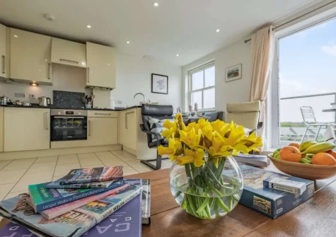 The living area & kitchen at 8 Cobourg House, Tenby