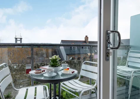 The balcony & outdoor sitting area at 8 Cobourg House, Tenby