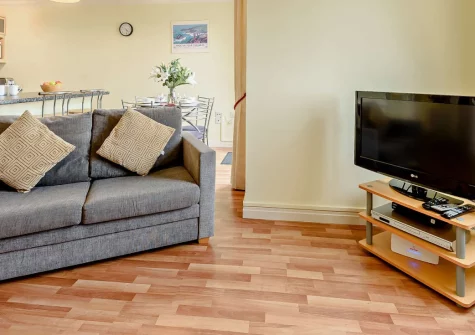 Aeradŵr, Broad Haven is a charming two-bedroom seafront apartment offering a private balcony with glorious bay views, ideally placed for Pembrokeshire's golden beaches, the scenic coast path, and a wealth of local family-friendly attractions.