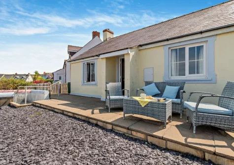 The patio garden & outdoor sitting area at Awel Y Môr, Broad Haven