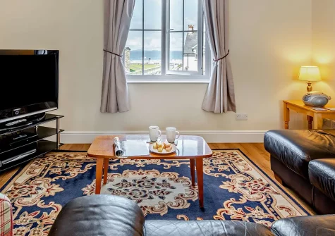 Awel Y Môr, Broad Haven, is a charming two-bedroom cottage with stunning sea views opposite the beach. Enjoy single-level comfort, enclosed gardens, and easy access to golden sands, coastal walks, and Pembrokeshire's attractions. Perfect for family.