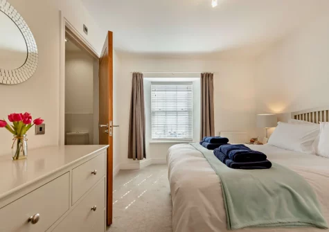 Bedroom #1 & en-suite shower room at Bay View, Saundersfoot