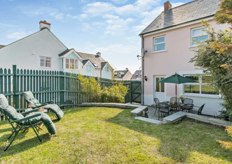 The patio, alfresco dining area & fully enclosed garden at Beach Haven, Broad Haven