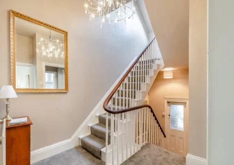 The stairs to the upper floor at Beaufort Apartment, Tenby