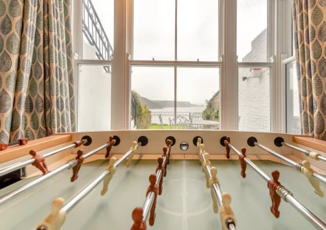 The snug / cinema room, with football table, at Belle Vue House, Tenby