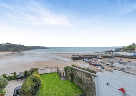 The garden, with direct access to the beach, at Belle Vue House, Tenby