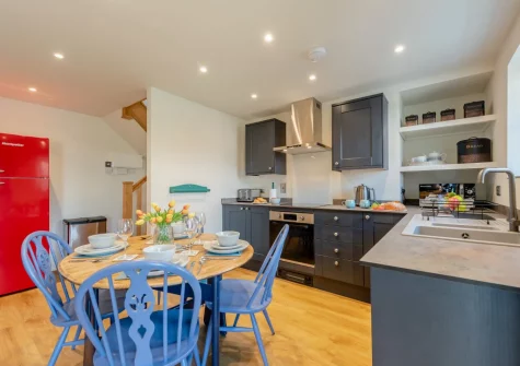 The kitchen & dining area at Berry Cottage, Little Haven
