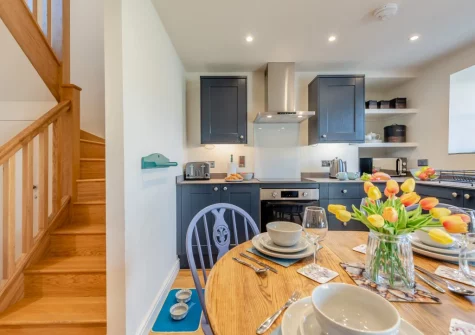 The kitchen & dining area at Berry Cottage, Little Haven