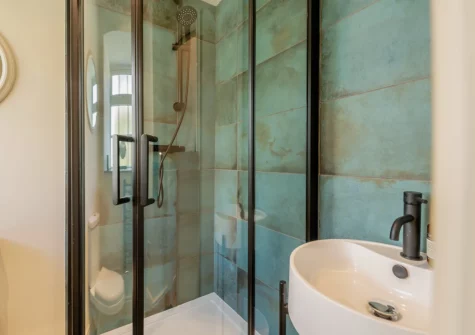 Bedroom #1 en-suite shower room at Berry Cottage, Little Haven