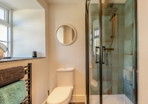 Bedroom #1 en-suite shower room at Berry Cottage, Little Haven