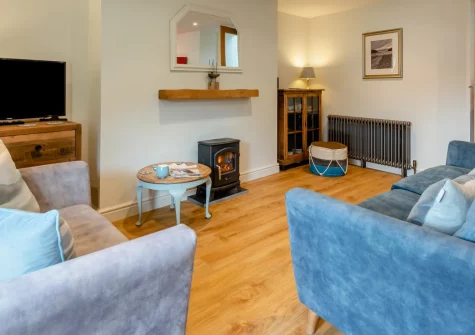 Berry Cottage, Little Haven is a charming Grade II listed retreat in a pretty Pembrokeshire coastal village, featuring heritage windows, two enclosed gardens, and allocated parking, with sandy beaches and the legendary Coast Path on the doorstep.