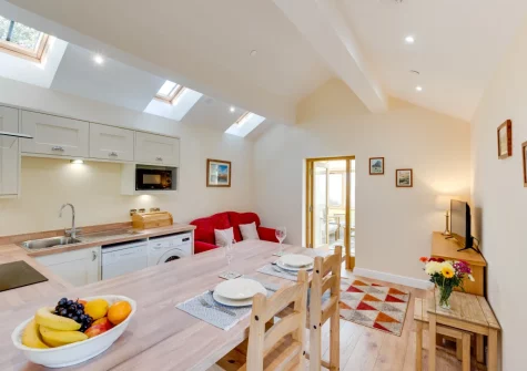 The kitchen, breakfast bar dining & living area at Beudy Bach, Llanrwst