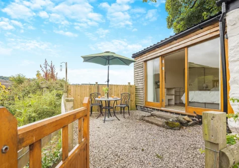 The enclosed patio & alfresco dining area at Beudy Bach, Llanrwst